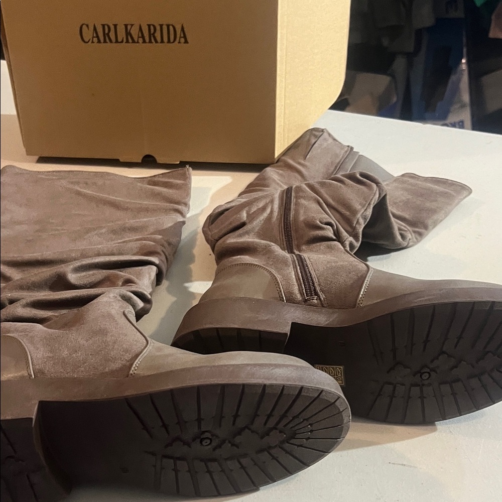 Women’s size 10 brown suede boot Carlkarida zipper on side